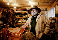 Saddle maker, Mark Nelson, in his home workshop in Boyceville, Wisc. — Sean McCormick